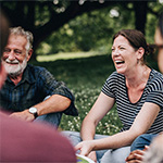 A group of people having a cheerful conversation