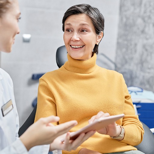 a patient speaking with her dentist