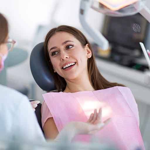 Woman smiling in the dental chair